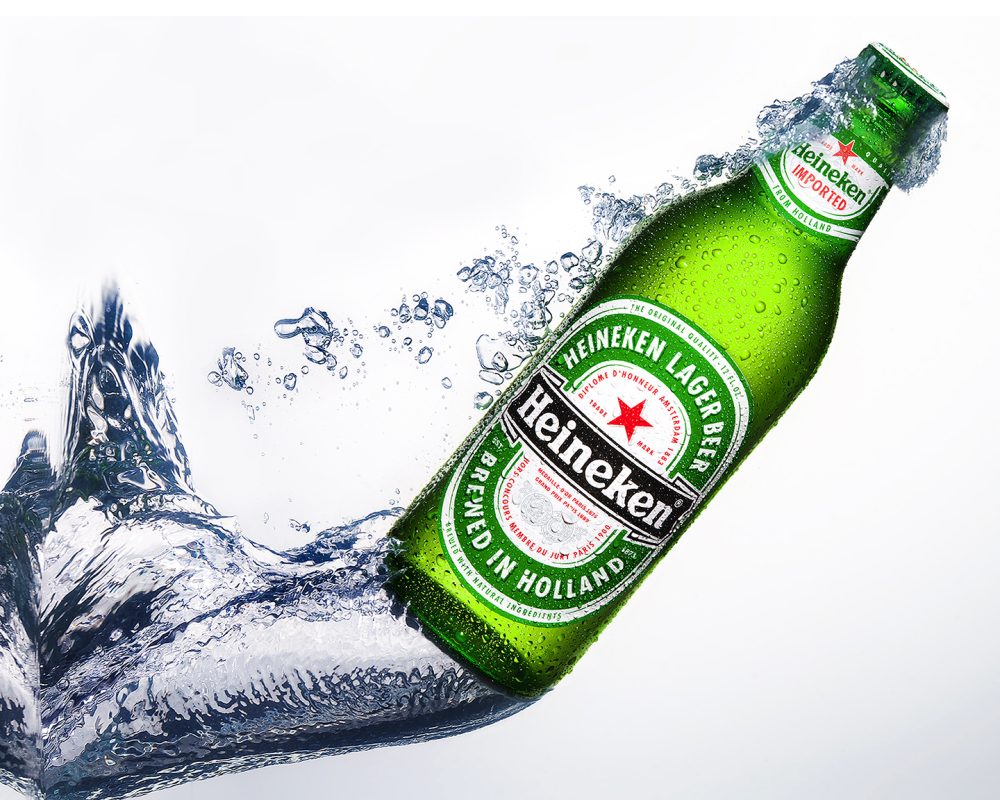 Heineken beer bottle splash photo by Jens Johnson Photography. Premium food, beverage, and product photography for Connecticut and New York.