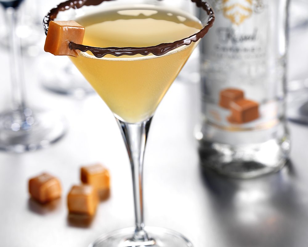 Smirnoff Caramel Vodka bottle and  glass photo by Jens Johnson Photography. Premium food, beverage, and product photography for Connecticut and New York.
