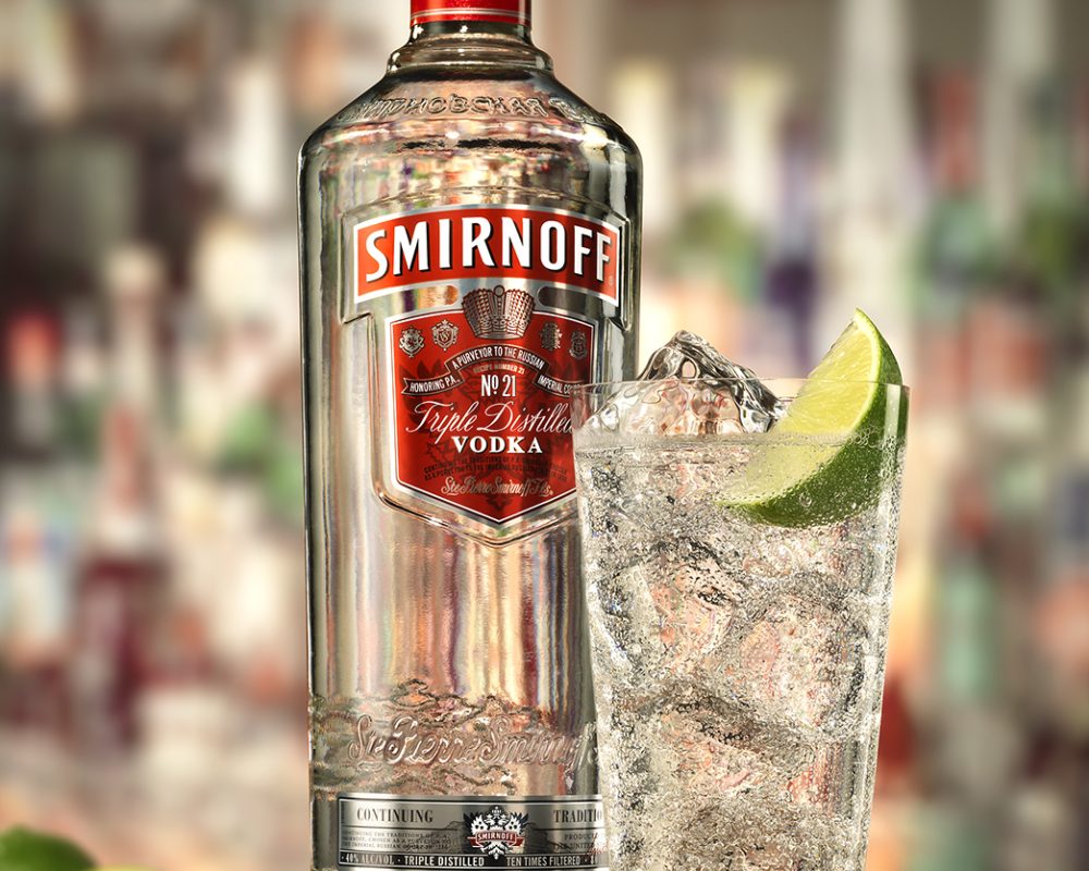 Smirnoff Vodka bottle and glass with a lime photo by Jens Johnson Photography. Premium food, beverage, and product photography for Connecticut and New York.