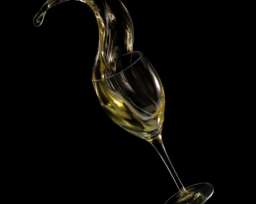 White wine splash photo by Jens Johnson Photography. Premium food, beverage, and product photography for Connecticut and New York.